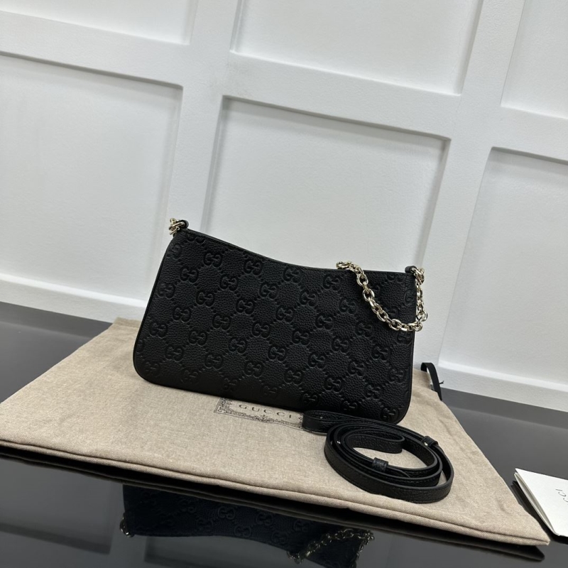 G*u*i top handle bags